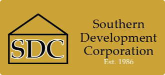 A logo of the south development corporation.