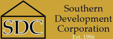 A logo of the south development corporation.