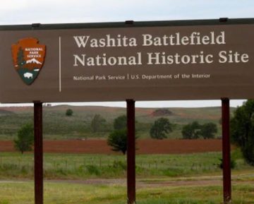 A sign for the national historic site of washita battlefield.